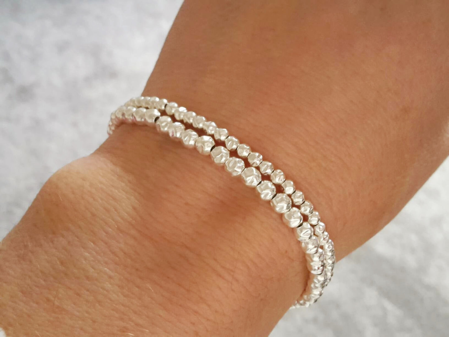 Silver bead bracelet.