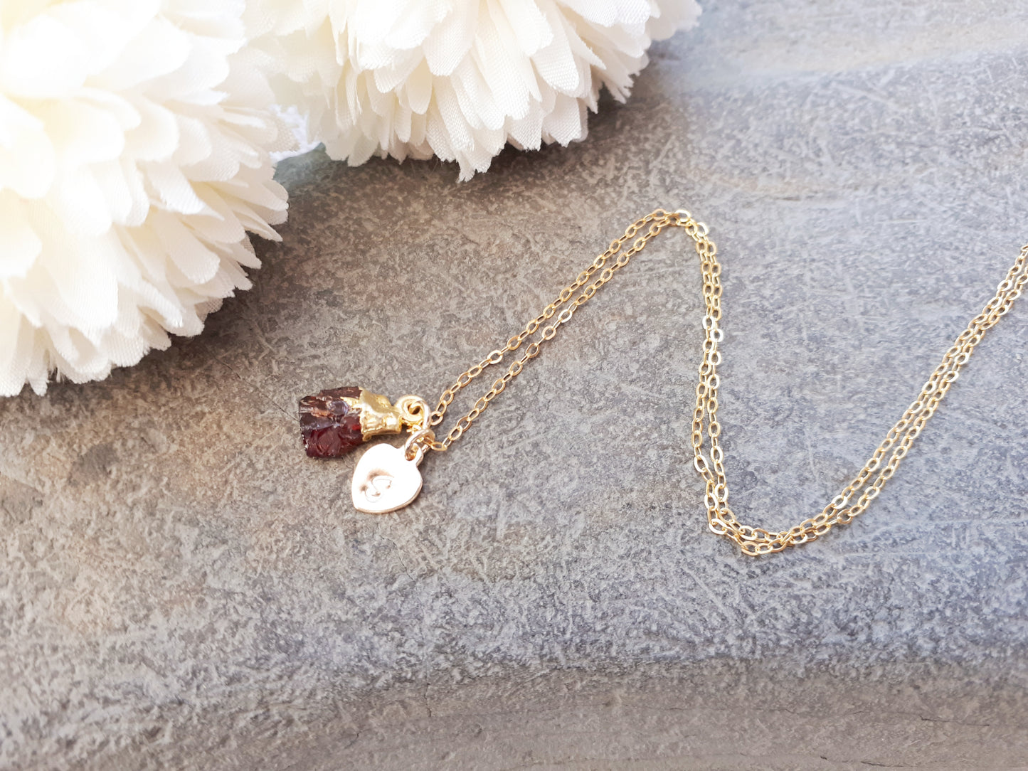Personalised raw garnet gemstone necklace in gold.