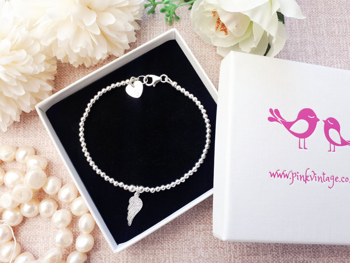 Angel wing charm bracelet.
