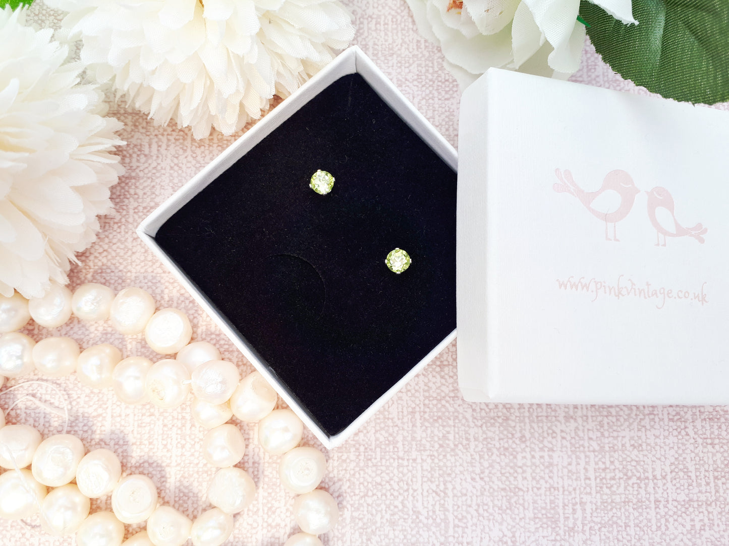 Peridot stud earrings in silver or gold.