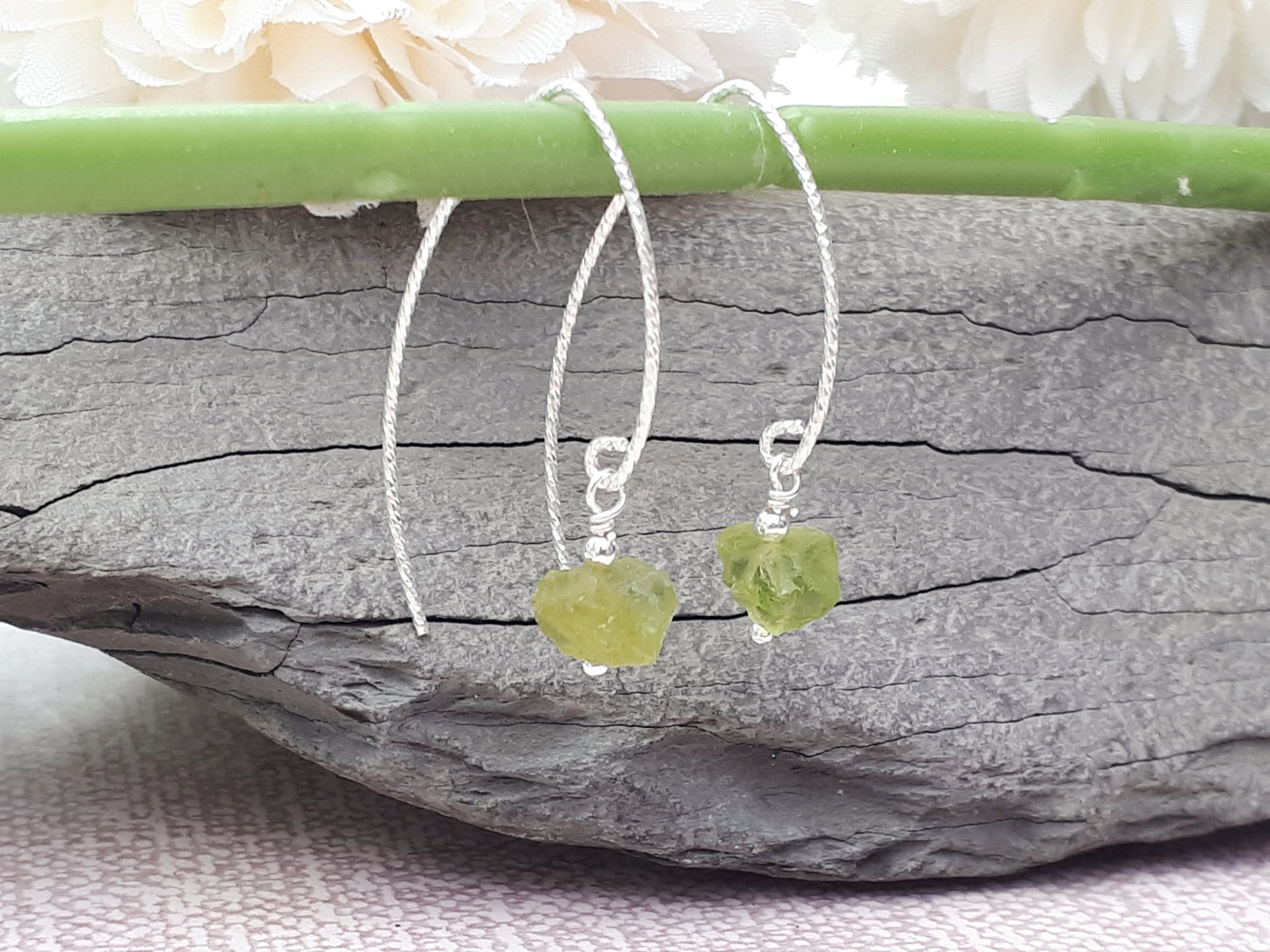 Raw peridot earrings in sterling silver.