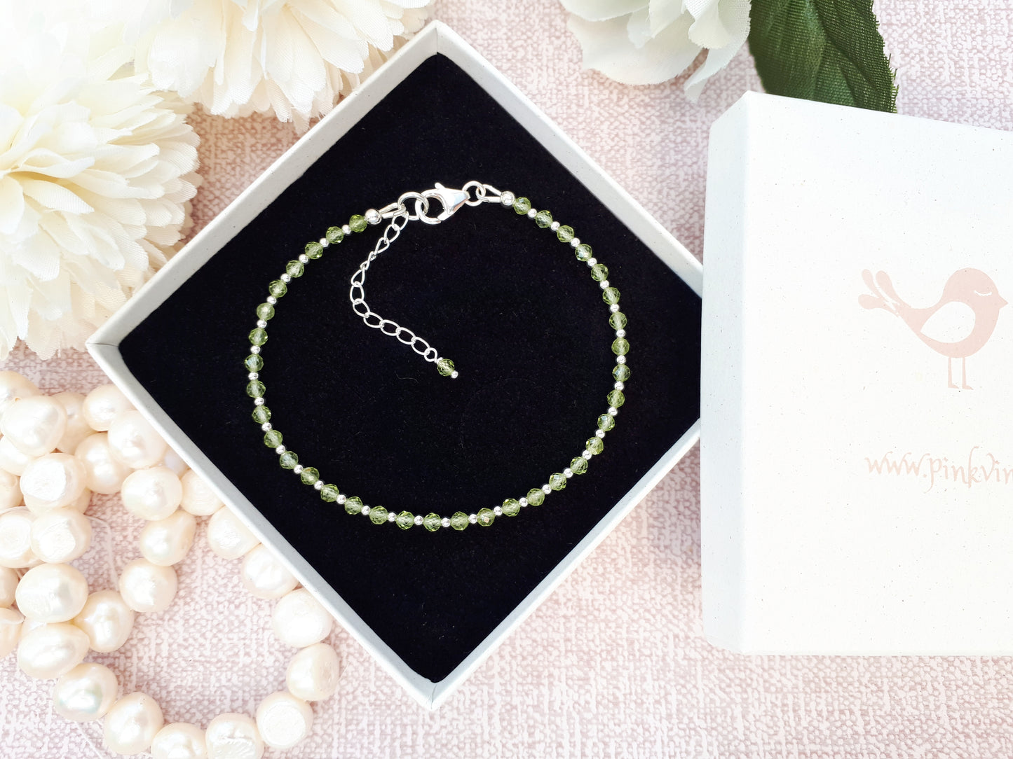 Personalised peridot bracelet in sterling silver.