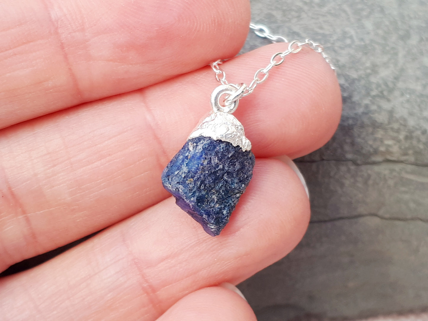 Raw sapphire necklace in sterling silver.