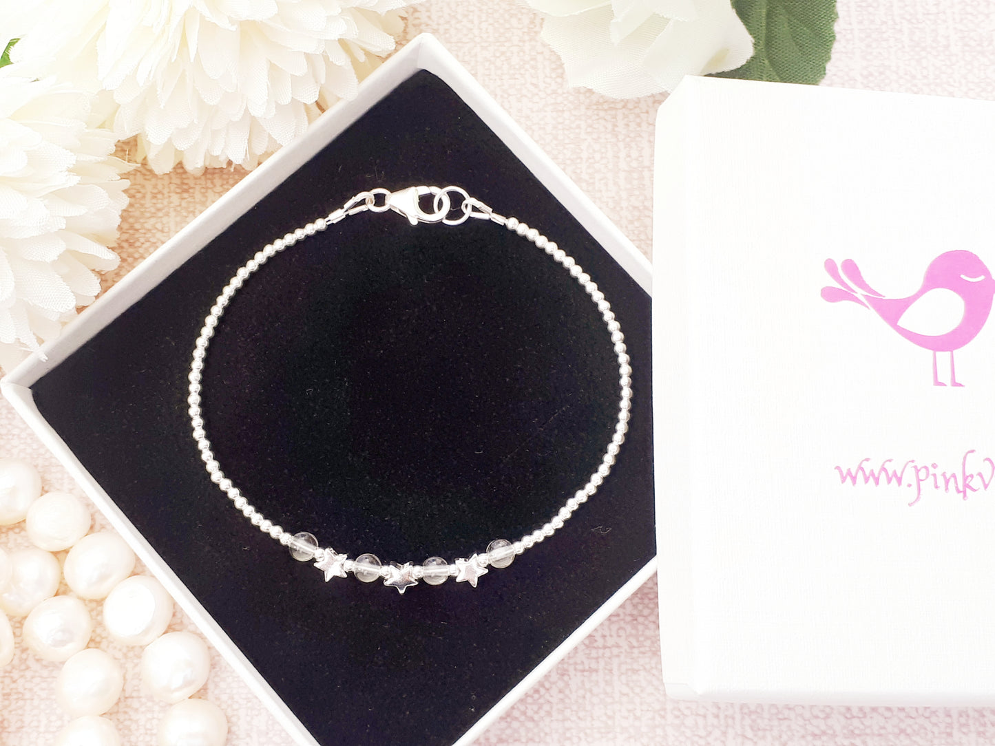 April birthstone star bracelet in silver.