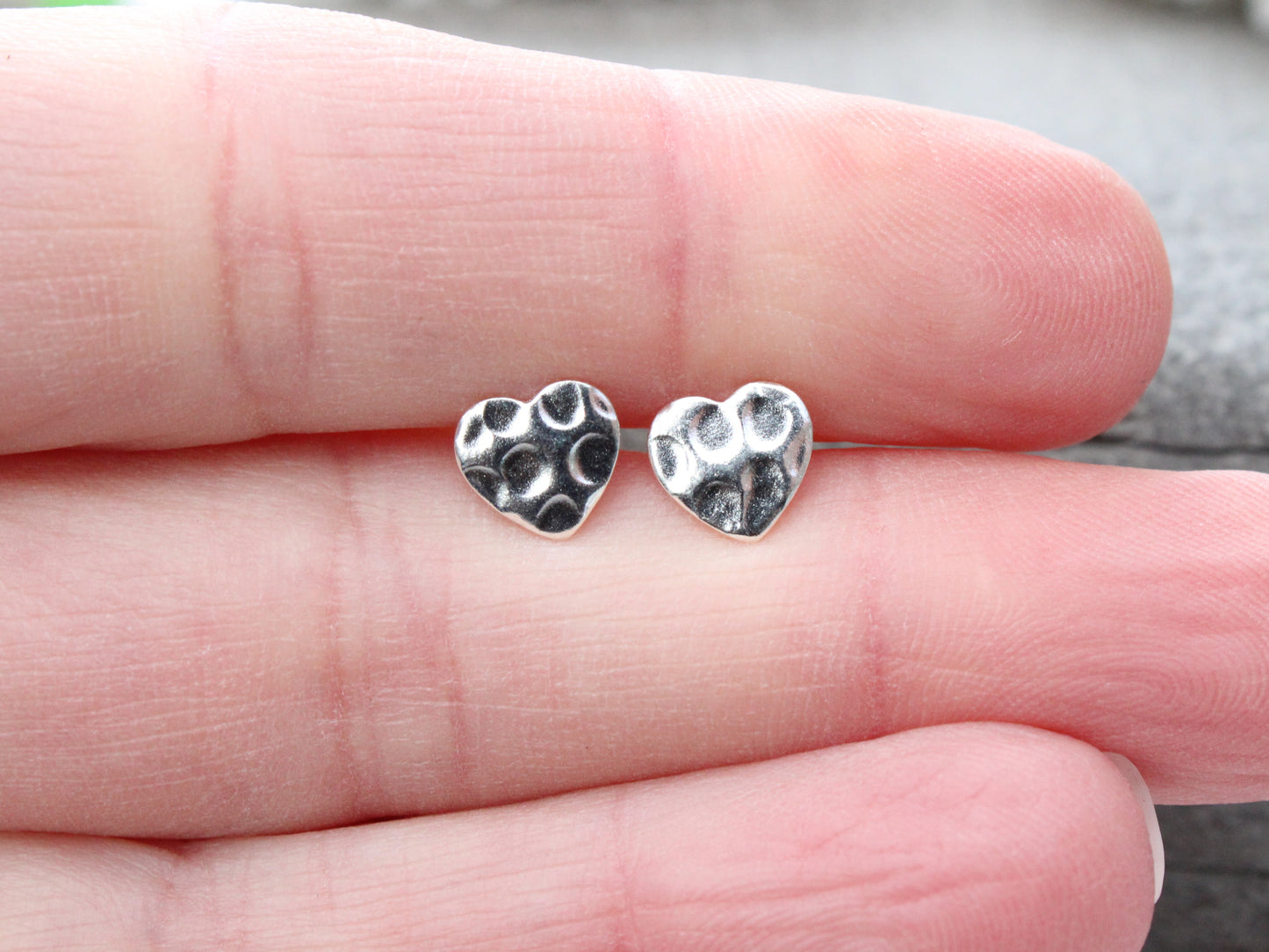 Hammered heart stud earrings.