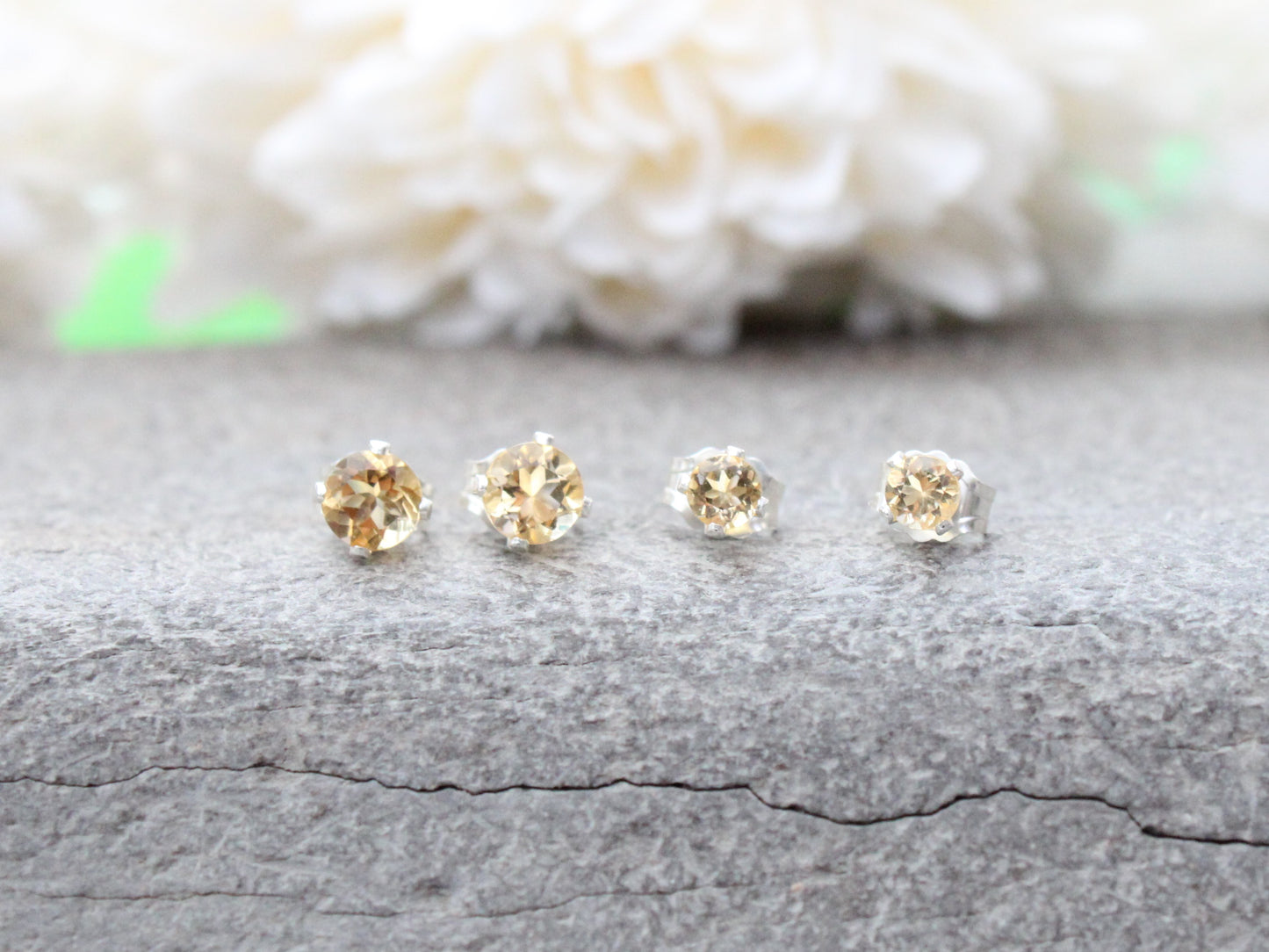 Citrine stud earrings in sterling silver or gold.