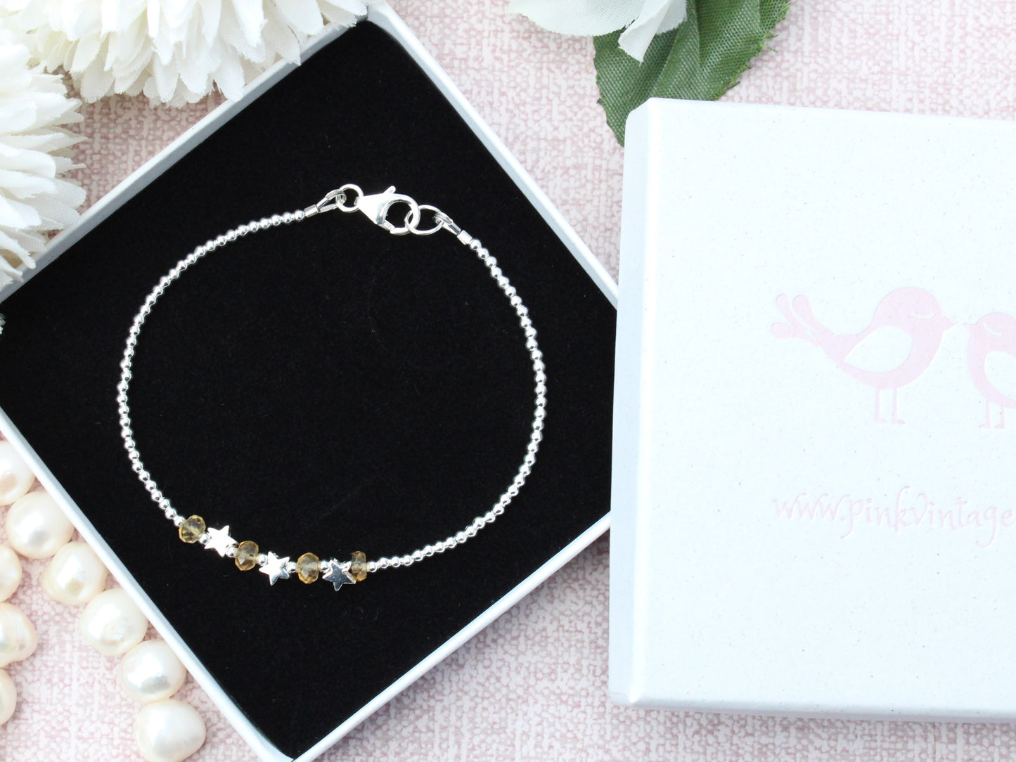 Star bracelet with citrine gemstones.