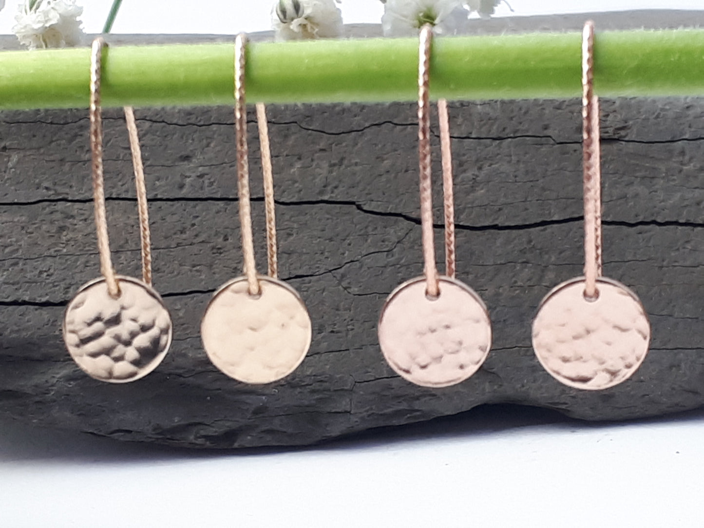 Hammered disc earrings in silver, gold and rose gold.