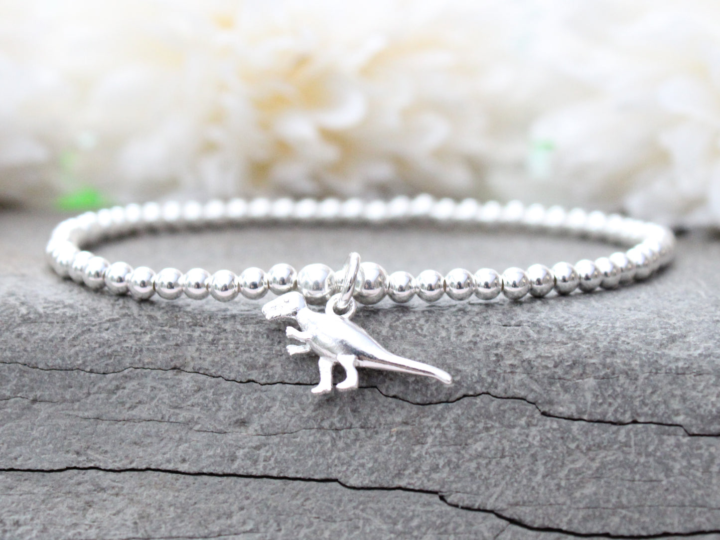 T rex charm bracelet.