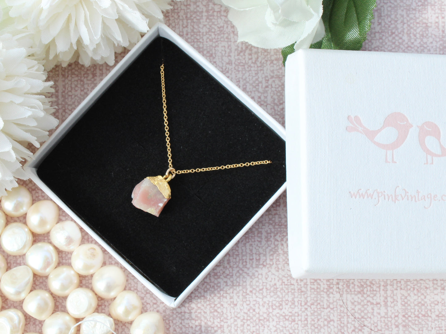 Raw pink opal necklace in gold.